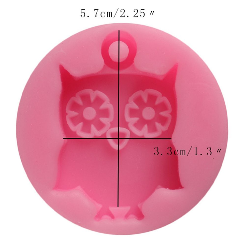 Cute owl-shaped silicone mold for cake, cookies, and sugar paste baking, ideal for kids' pretend play and baking activities.