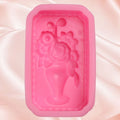 Silicone mold in baby bottle shape for cake decorating, cookies, and sugar paste, perfect for pretend play baking projects.