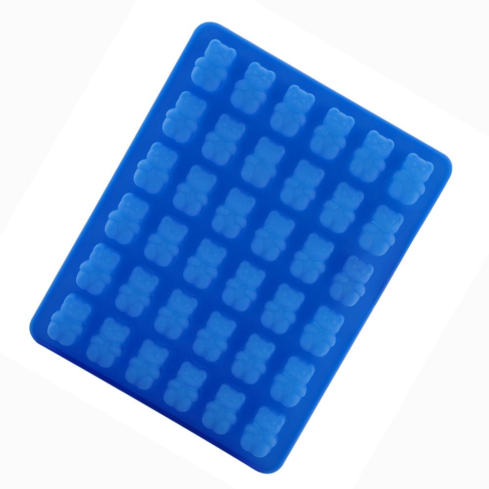 Dark blue silicone bear-shaped ice cube tray with dropper for baby feeding, ideal for making ice, chocolate, or ice cream treats.