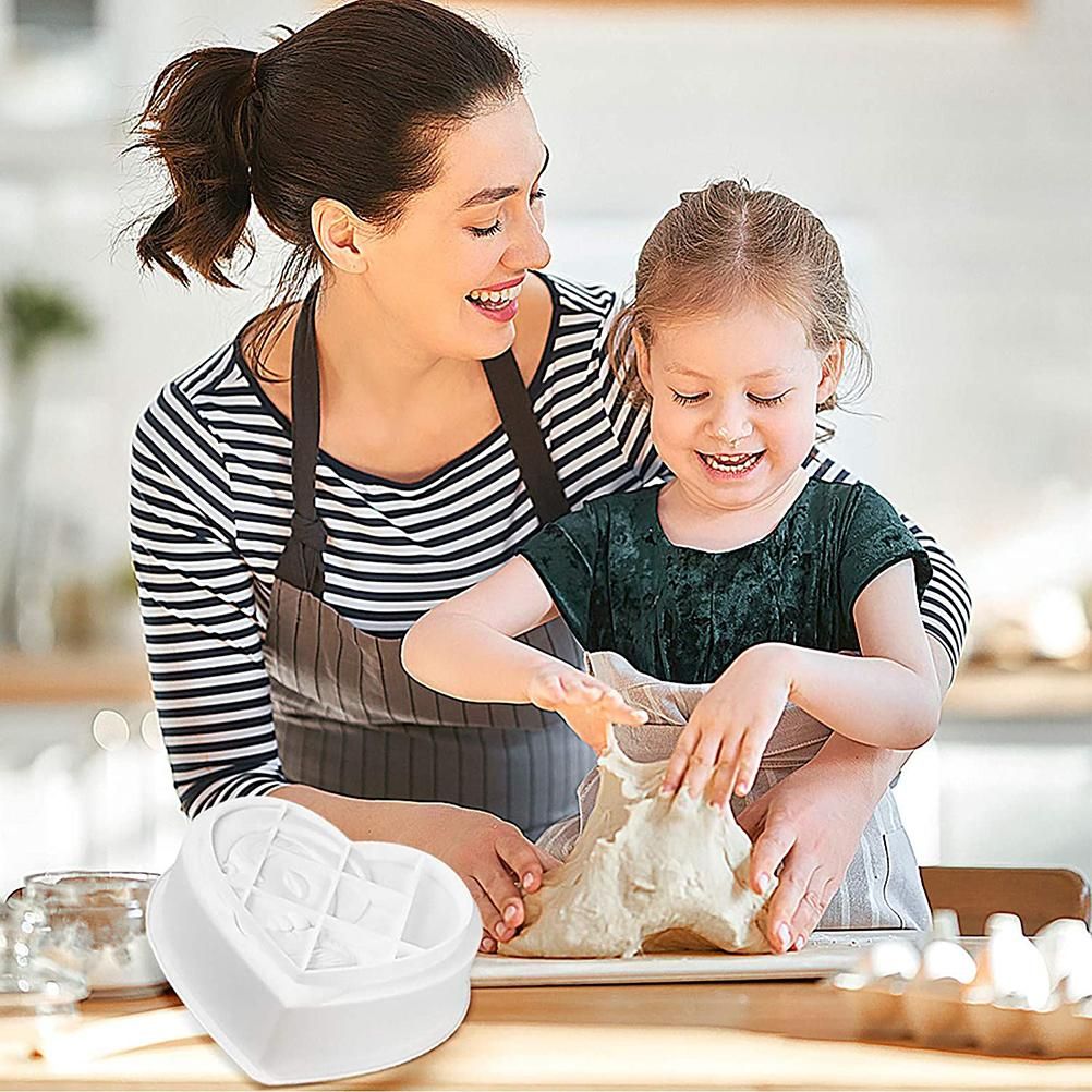 Heart-shaped silicone cake mold for baking, ideal for making chocolates and treats, part of kitchen baking tools by Everything Baby.