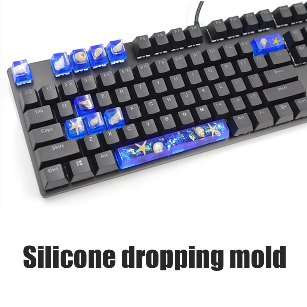 Silicone mold for DIY mechanical keyboard keycaps, soft and durable, designed for creating pretend play toy keys for kids.