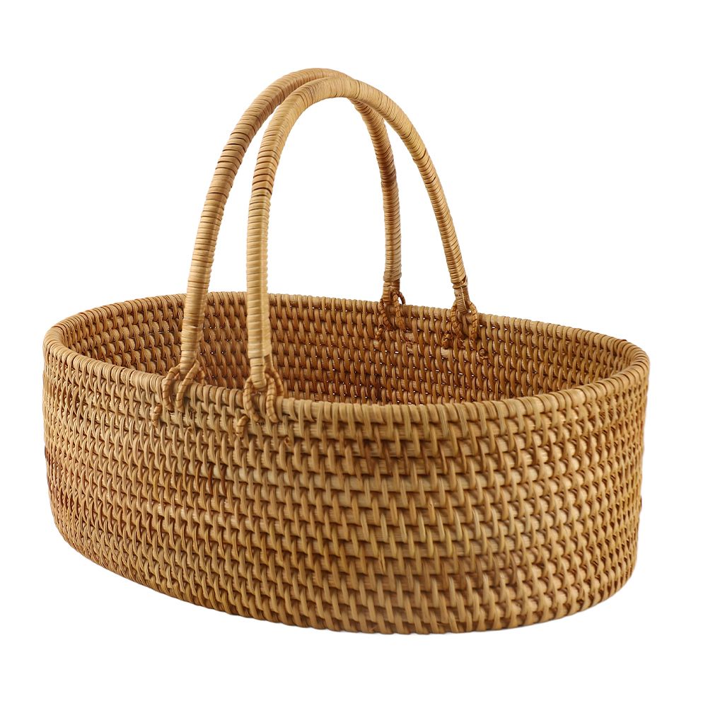 Rattan woven oval basket for fruit, flowers, or toys, portable handheld wicker basket for home, outdoor, or picnic use.