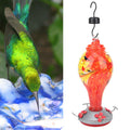 Colorful glass bird feeder with hummingbird design, outdoor garden water feeding tool, perfect for attracting birds to your courtyard.