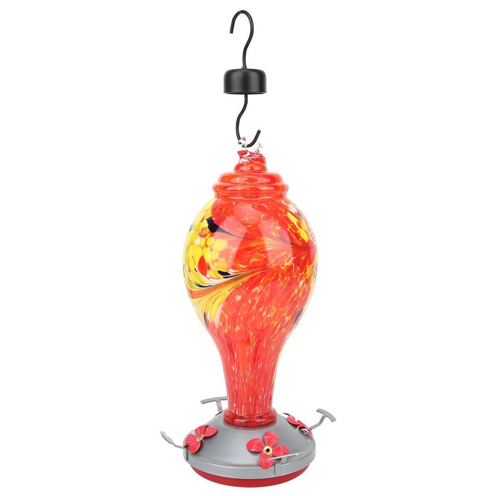 Colorful glass bird feeder with hummingbird design, outdoor garden decoration and water feeding tool for birds.