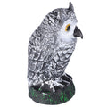 Plastic hunting owl decoy for outdoor gardens and yards, designed to deter pests and scare away birds.