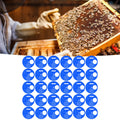 Blue plastic beehive door entrance disc, round exit vent gate for beekeeping, with safety features and durable design.