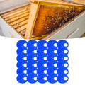 Blue plastic beehive door entrance disc for beekeeping, round exit vent gate, safety accessory for hive management.