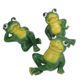 Three colorful outdoor frog garden ornaments by Everything Baby, designed for yard and lawn decoration in a playful American style.