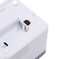 Automatic toothpick dispenser holder with smart sensor, compact design for home or restaurant use, suitable for kitchen or commercial settings.