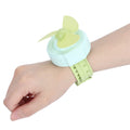 Green cartoon watch-shaped adjustable mini kids' wrist fan with USB charging, designed for children, by Everything Baby.