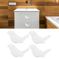 White ceramic bird-shaped drawer knobs, set of four, decorative handles for furniture, from Everything Baby.