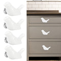 White ceramic bird-shaped drawer knobs set for furniture, perfect for DIY door and cupboard handle accessories.