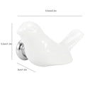 White ceramic bird-shaped drawer knobs set, perfect for DIY furniture, cabinet, and cupboard handles in children's bedroom decor.
