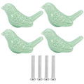 Set of four green bird-shaped ceramic knobs for DIY door and drawer handles on furniture, ideal for kids' changing tables.