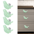 Green ceramic bird-shaped knobs set for DIY furniture, ideal for changing tables, drawer pulls, and cupboard handles.