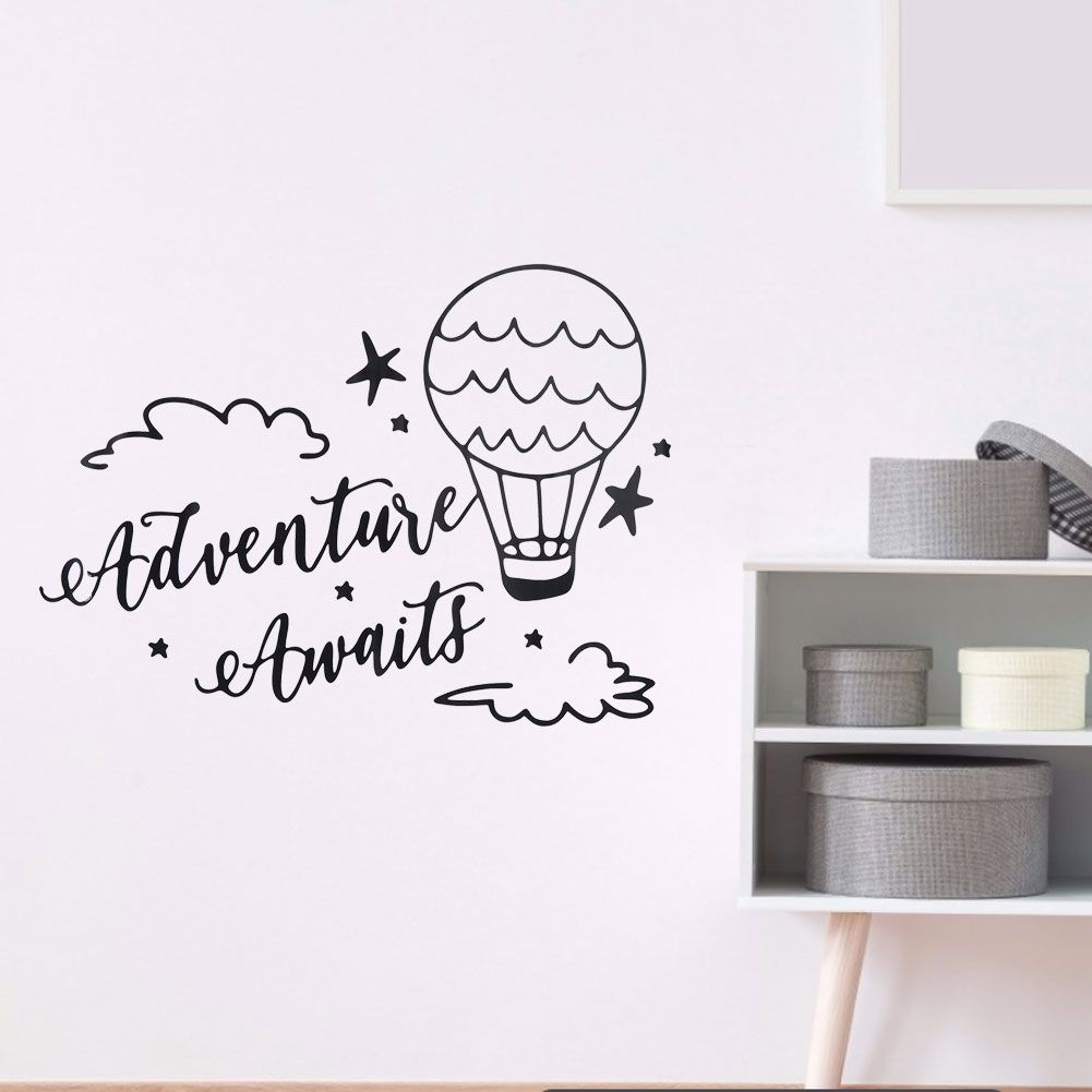 Removable wall sticker of cute cartoon clouds and balloons for kids' room decor, featuring playful designs from Everything Baby.