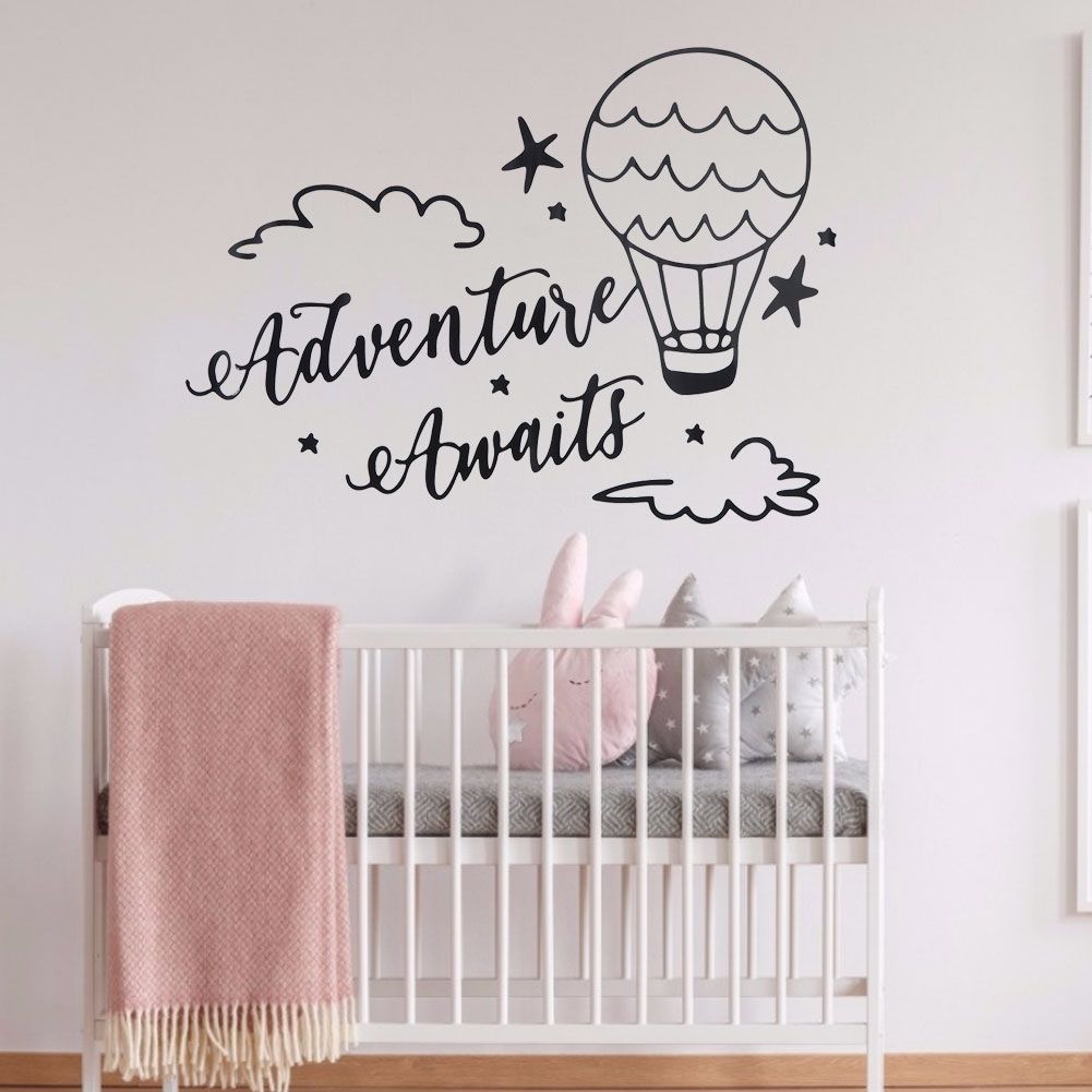 Removable wall sticker featuring cute cartoon clouds and balloons for kids' room decoration, by Everything Baby.
