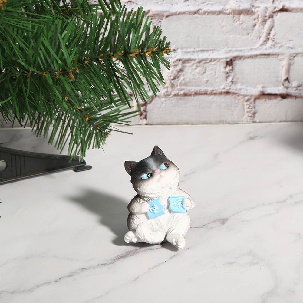 Mini simulation cat figurine toy by Everything Baby, suitable for cake topping, car decor, and pretend play for kids.