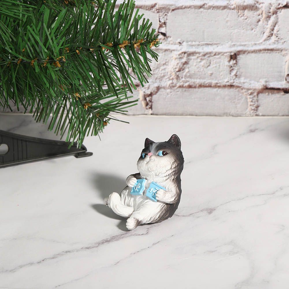 Mini simulation cat figurine toy by Everything Baby, perfect for cake decor, car decor, and pretend play for kids.
