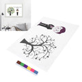 Baby boy at birthday party signing in with fingerprint signature art DIY toy by Everything Baby, showcasing playful art and drawing activity.