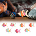 Set of 50 wooden buttons featuring colorful cartoon fish patterns, ideal for children's handmade toy and craft projects.