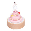 Wooden music box featuring a girl figure, ideal for birthday cake decoration or holiday gift, part of Everything Baby pretend play toys.