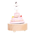 Wooden music box featuring a girl figure, ideal for birthday cake decoration or pretend play, by Everything Baby.