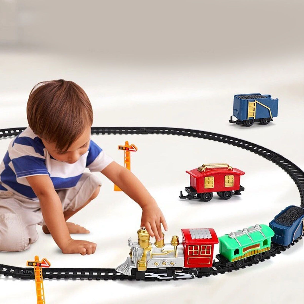 Everything Baby classic toy train set with festive Christmas theme, electric steam train on colorful track for kids' play.