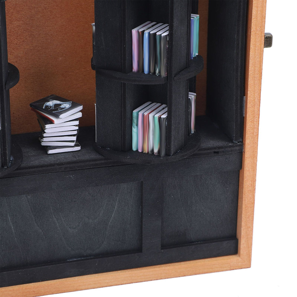 Miniature wooden and plastic display case for tiny books, rotatable library shelf for kids' room by Everything Baby.