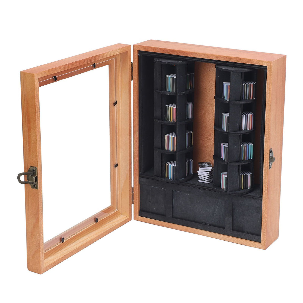Miniature wooden and plastic rotatable book display case for tiny library, ideal for kids' books and home decor.