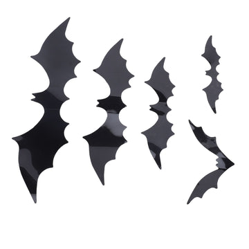 Set of 140 spooky black 3D bat wall decals for home or party decor, featuring backing sheets for easy application.