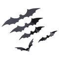Set of 140 spooky black 3D bat wall decals for Halloween or party decor, with backing sheets, by Everything Baby.