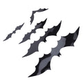 Set of 140 black 3D bat wall decals from Everything Baby, perfect for spooky home or party decor with backing sheets.