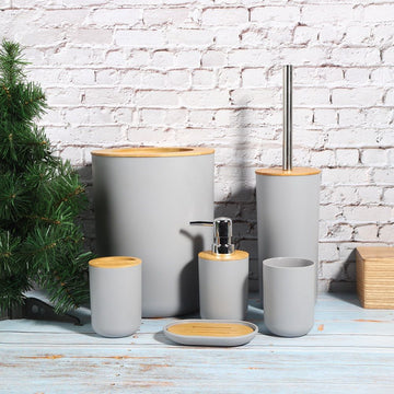 Six-piece gray bathroom soap box, toothbrush holder, rinse cup, and lotion bottle set from Everything Baby for baby and kids grooming.