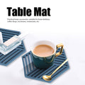 Blue hexagonal stripe dining table heat insulated mats for coasters, made of durable material, ideal for protecting tableware and surfaces.