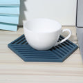 Blue hexagonal stripe dining table heat insulated coasters set with four tableware cup pads for kitchen and feeding purposes.