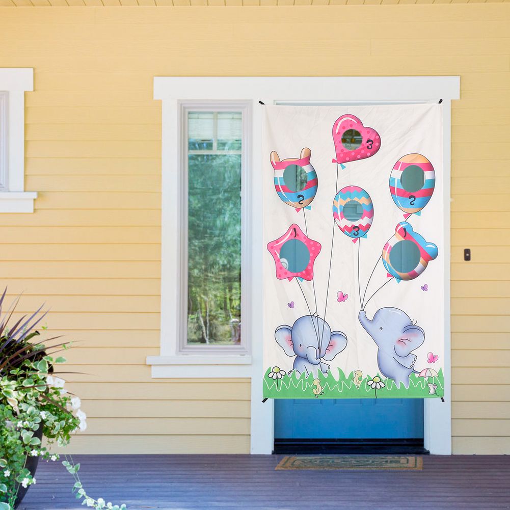 Indoor throwing game set with sandbag targets for children and families, featuring colorful door curtain for fun outdoor play.