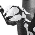 Kids wearing dinosaur inflatable costume for Halloween or parties, designed for pretend play and festive dress-up.