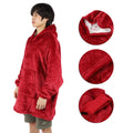 Red hooded fleece blanket hoodie for kids, featuring a cozy oversized design with front pocket, ideal for warmth and comfort.