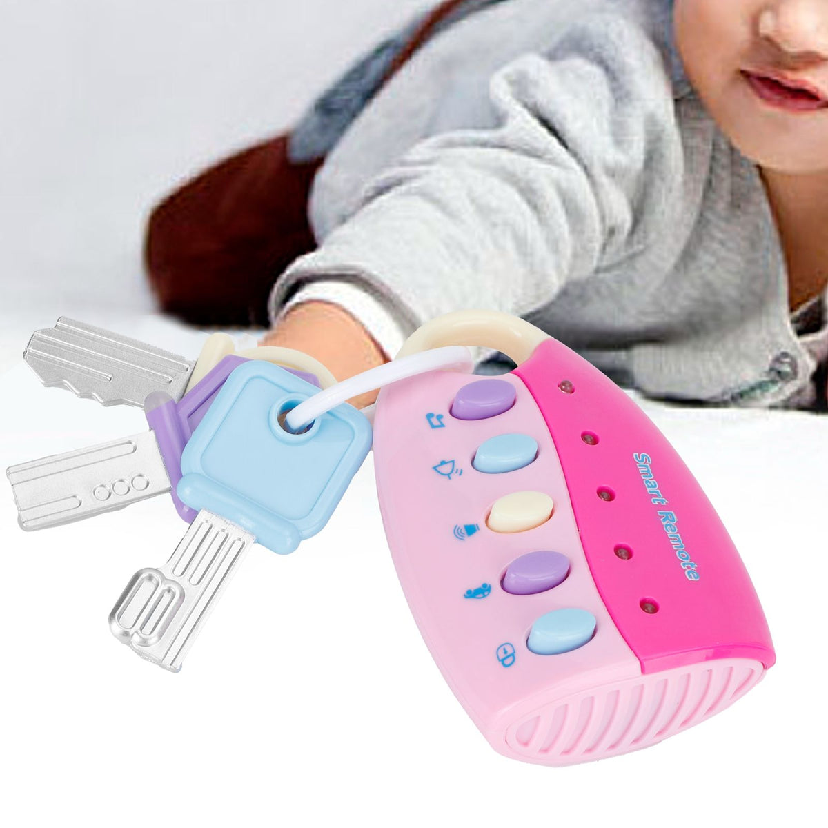 Pink simulated car key lock toy remote controller with light and music for children, part of riding car toys for kids.