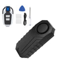 Black anti-theft bike and scooter alarm with vibration alert, designed for bicycles, electric scooters, motorcycles, and home use by Everything Baby.