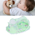 Foldable green baby mosquito-proof bed with cotton pillow and pad, designed for home and outdoor use by Everything Baby.