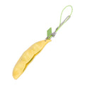 Edamame squeeze toy keychain for stress relief, featuring a realistic green edamame pod, perfect for kids and adults.
