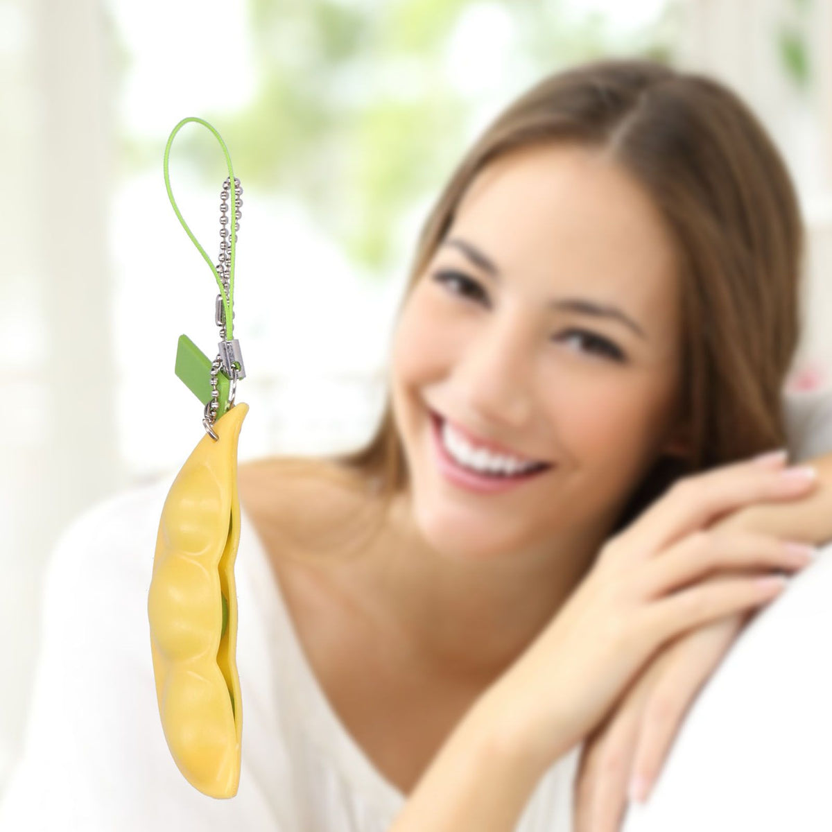 Edamame squeeze toy keychain from Everything Baby, stress-relief decompression toy with soft, squeezable design for kids and adults.