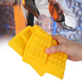 Yellow silicone ice cube mold with 10-grid design for DIY ice making, suitable for kids' play and creative projects.