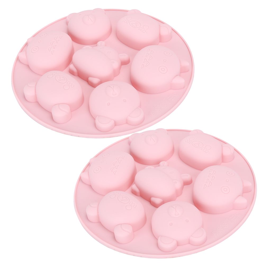 Pink silicone mold with cartoon animal shapes for cake and chocolate baking, ideal for kids' pretend play and baking fun.