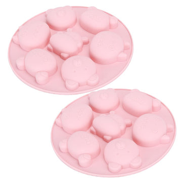 Pink silicone mold with cartoon animal shapes for cake and chocolate baking, ideal for kids' pretend play and baking fun.