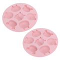 Pink silicone mold with cartoon animal shapes for baking and pretend play, ideal for cake and chocolate decorating.