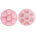 Pink silicone mold featuring cartoon animal shapes for baking and pretend play, ideal for kids' cake and chocolate decorations.