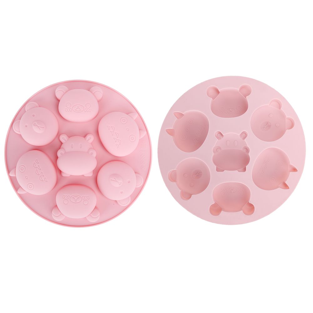 Pink silicone mold featuring cartoon animal shapes for baking and pretend play, ideal for kids' cake and chocolate decorations.